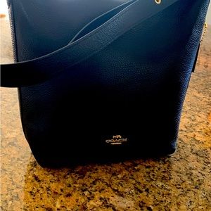 Coach over shoulder bag. Also can be a crossbody bag